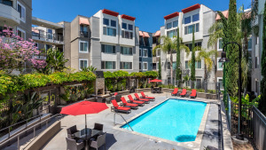 furnished apartment with a pool as one of the features